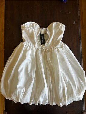 PrettyLittleThing White Strapless Bubble Hem Mini Dress